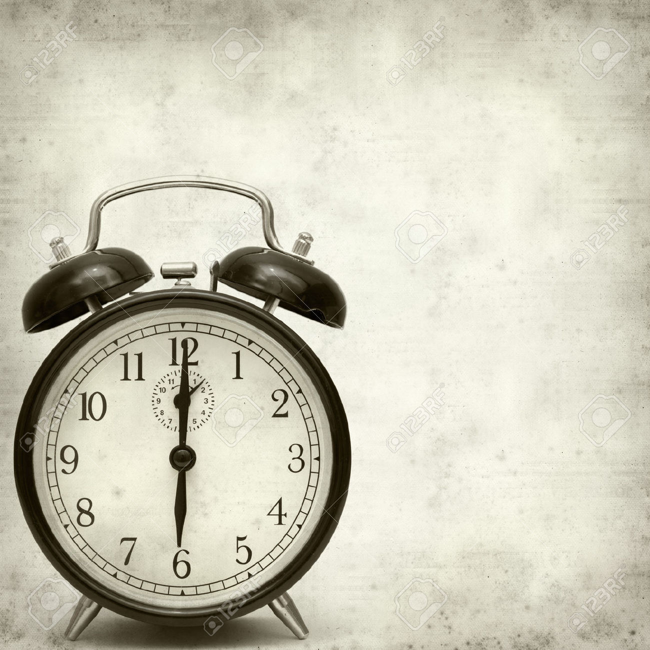 22480590-old-fashioned-alarm-clock-Stock-Photo-antique