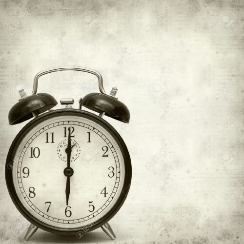 22480590-old-fashioned-alarm-clock-Stock-Photo-antique